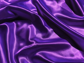 Pattern of purple fabric texture background.  wavy folds of grunge silk texture satin velvet material for design