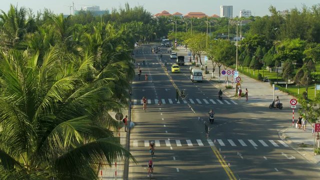 12th May 2019 in Danang, Vietnam. Aerial view of triathletes racing along the beautiful coastal road under the hot and humid weather