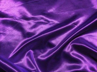 Beautiful smooth purple fabric texture background with copy space for design