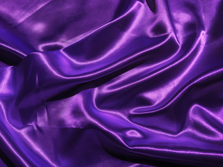 Beautiful smooth purple fabric texture background with copy space for design