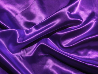 Beautiful smooth purple fabric texture background with copy space for design