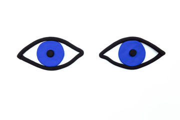 Pair of waching blue eyes on white background. Observing concept, flat lay mockup. Ophthalmic...