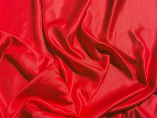 Red fabric texture for backgroundwith coy space. Valentines Day or Christmas Day wallpaper design