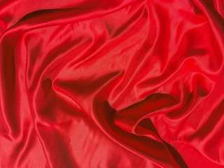 Red fabric texture for backgroundwith coy space. Valentines Day or Christmas Day wallpaper design