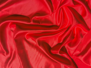Red fabric texture for backgroundwith coy space. Valentines Day or Christmas Day wallpaper design