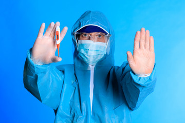 The doctor holds a test tube with blood. Testing for infection with a new coronovirus. China's new virus called 2019-nCoV