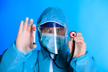 The doctor holds a test tube with blood. Testing for infection with a new coronovirus. China's new virus called 2019-nCoV