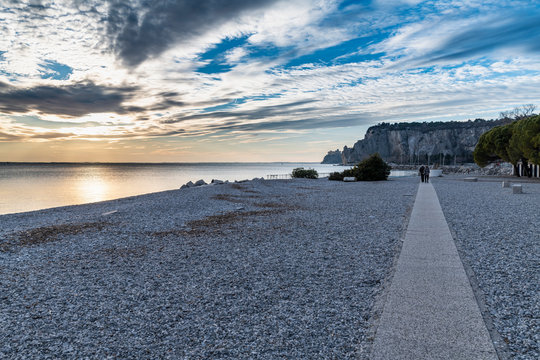 Winter sunset over the bay of Portopiccolo Sistiana. Duino. Italy