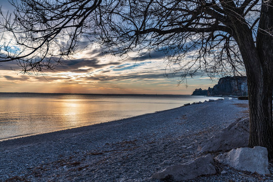 Winter sunset over the bay of Portopiccolo Sistiana. Duino. Italy