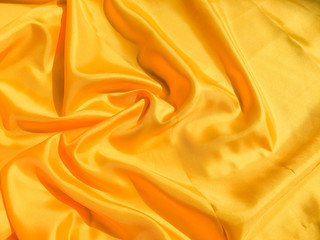 Minimal yellow fabric texture background. smooth elegant wavy light with cpoy space