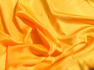 Minimal yellow fabric texture background. smooth elegant wavy light with cpoy space