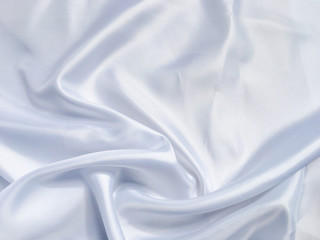 Fototapeta premium Solf white satin fabric texture background. use as wedding or aniversary day with copy space for design