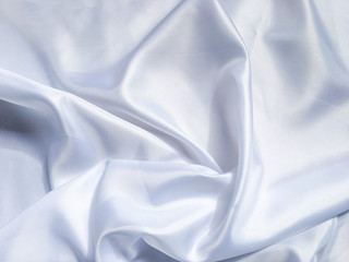 Obraz premium Solf white satin fabric texture background. use as wedding or aniversary day with copy space for design