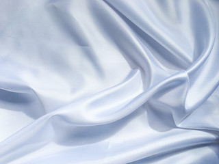 Obraz premium Solf white satin fabric texture background. use as wedding or aniversary day with copy space for design