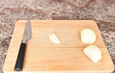 Food Photography onion and knife on wooden board