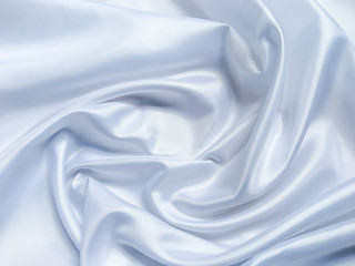 white crumpled fabric texture background. Silk curtain with fold waves for design