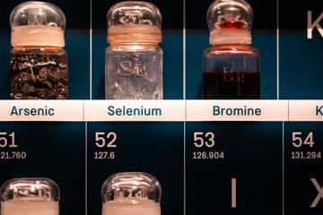 Chemistry lab during covid-19 in Europe, London. Bromine and selenium vials, close up of elements in periodic table.