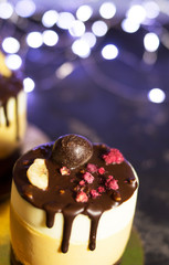 Mousse cake on the shelves at the party. Time to have fun. Selective focus and blurred background. The concept of cooking
