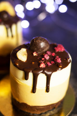 Mousse cake on the shelves at the party. Time to have fun. Selective focus and blurred background. The concept of cooking