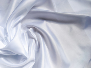 white crumpled fabric texture background. Silk curtain with fold waves for design