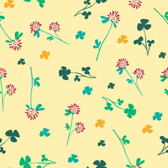 Spring or summer seamless pattern with clover flowers and leaves on a yellow background for printing on fabric or textile, Scandinavian vector stock illustration with random wildflowers
