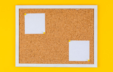 abstract paper note pin on cork board. Blank notes for add text message or design website. sticker note on yellow background