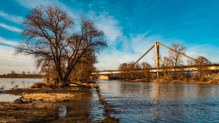 Beautiful winter view with flood damage near Mettenufer, Danube, Bavaria, Germany