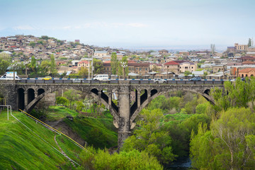 Fototapeta na wymiar A view of Victory Bridge over Hrazdan river in Yerevan city, Armenia