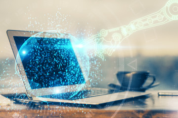 Double exposure of desktop computer and technology theme hologram. Concept of software development.