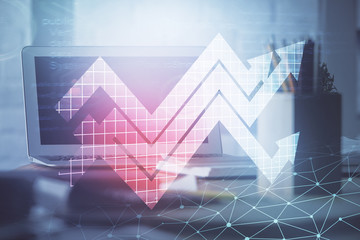 Computer on desktop with point up arrows hologram. Double exposure. Concept of success.