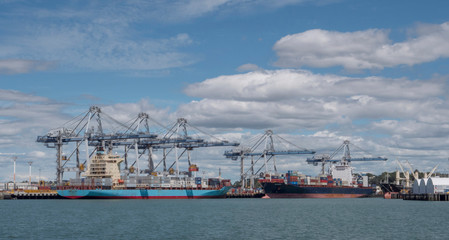 Auckland New Zealand Harbour cranes and boats containers