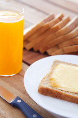 Bread and butter with knife
