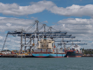 Auckland New Zealand Harbour cranes and boats containers