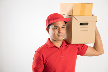 Red Delivery handsome asian man holding parcel cardboard box on isolated white background.