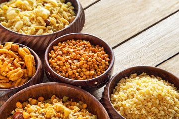 Close-up of fried snacks in bowls
