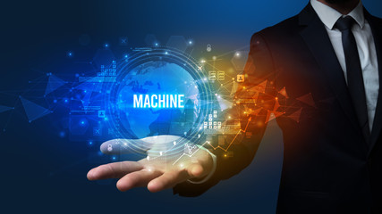 Elegant hand holding MACHINE inscription, digital technology concept