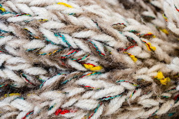 Macro photo of a knitted winter hat.