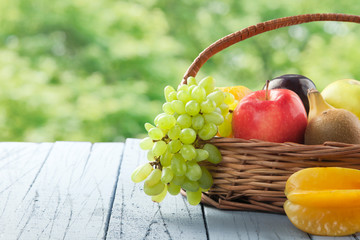 Wicker basket filled with fresh fruits