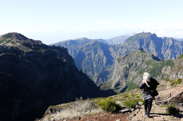 Fototapeta na wymiar hiking through windy mountains