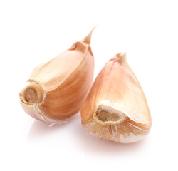 Garlic cloves isolated on white background