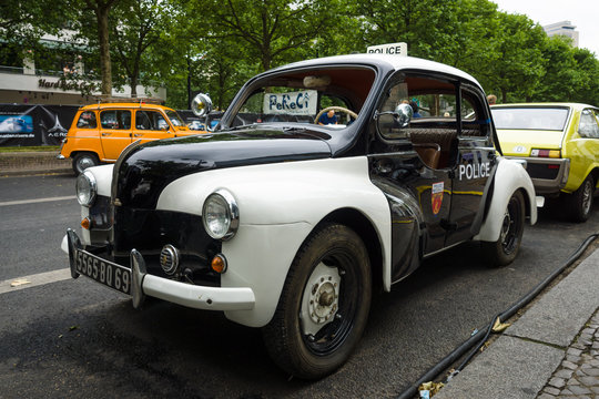BERLIN - JUNE 14, 2015: Compact car Renault 4CV (Police car). The Classic Days on Kurfuerstendamm.