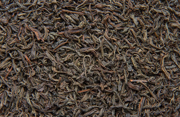 Dried black and red tea leaves.