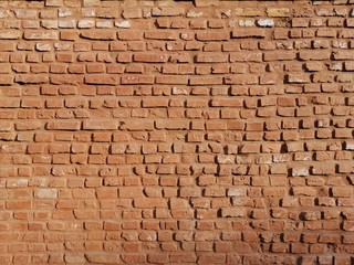 Texture of old red clay brick masonry.