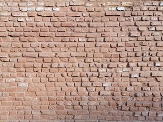 Texture of old red clay brick masonry.