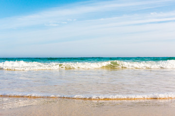 Bursts of sea waves on a tropical sea beach,