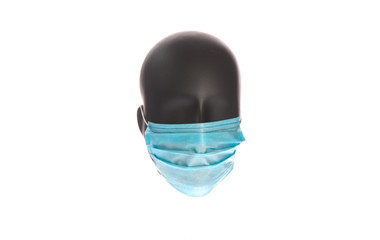 mannequin head in medical mask isolated on white background
