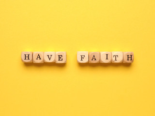 Have faith written with small wooden blocks
