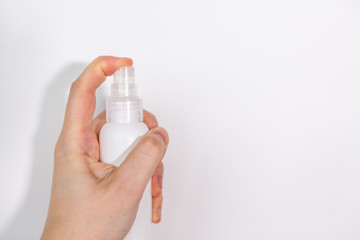 Disinfecting spray or antibacterial soap and face mask for prevention of coronavirus, top view, thermometer with temperature, background