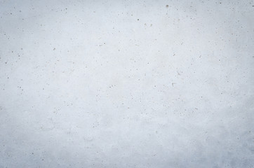 The texture of the old gray concrete wall for the background