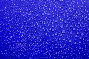 Water drops on blue background